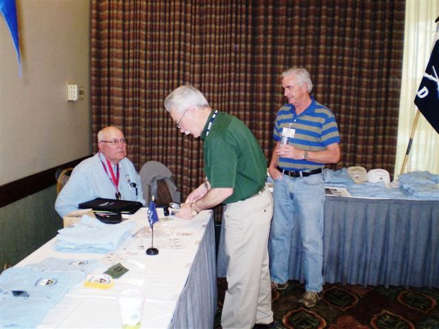 (8) Sales- Dan Srteit (seated), Jim May & unknown